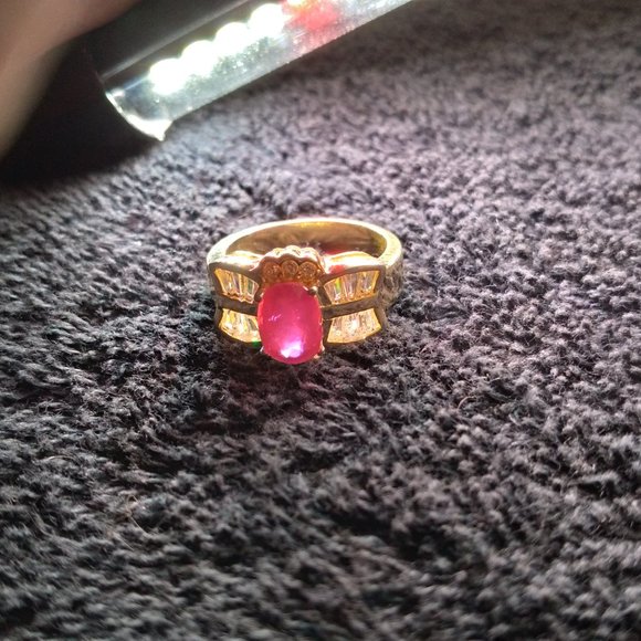 African Pink ruby and cubic zirconia set in silver and gold